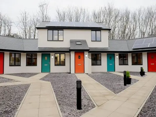launchpad houses with coloured doors