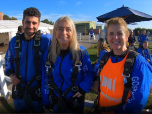 launchpad people standing in skydiving suits