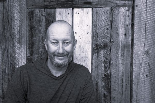 Head shot of bald man