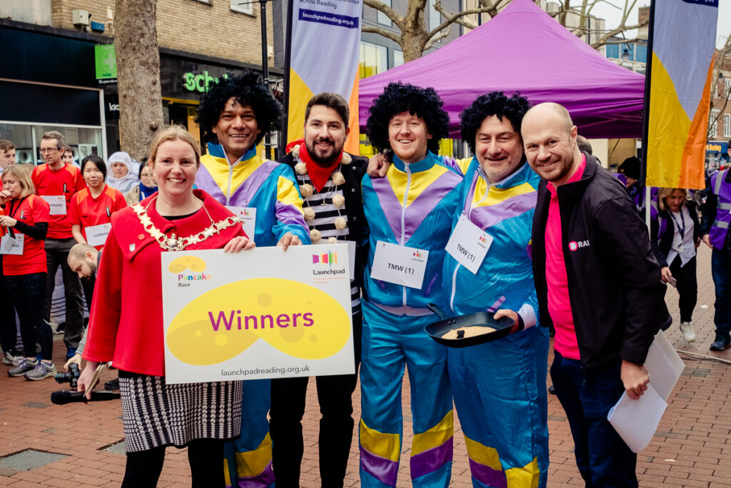 The winning team group photo at Launchpad's 22023 Pancake Race