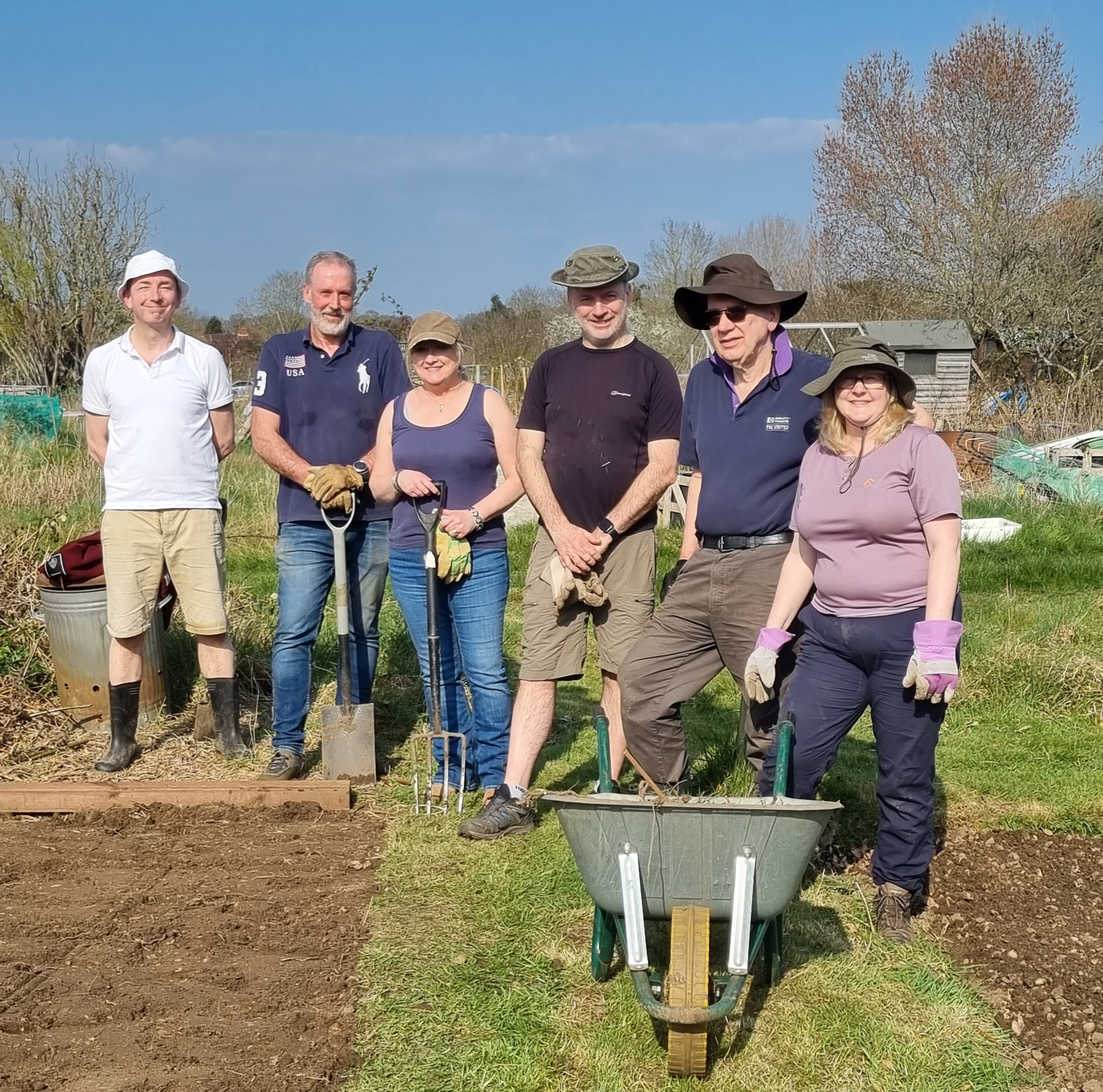 Corporate volunteers hard at work at Launchpad's allotment in Woodley, Reading.