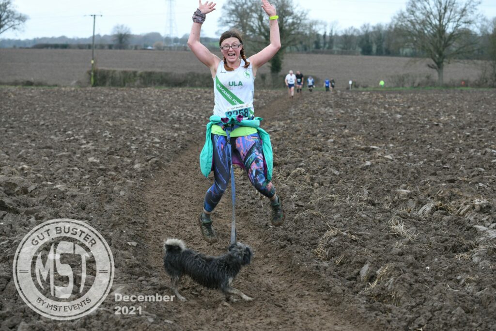Woman taking part in Gut Buster run
