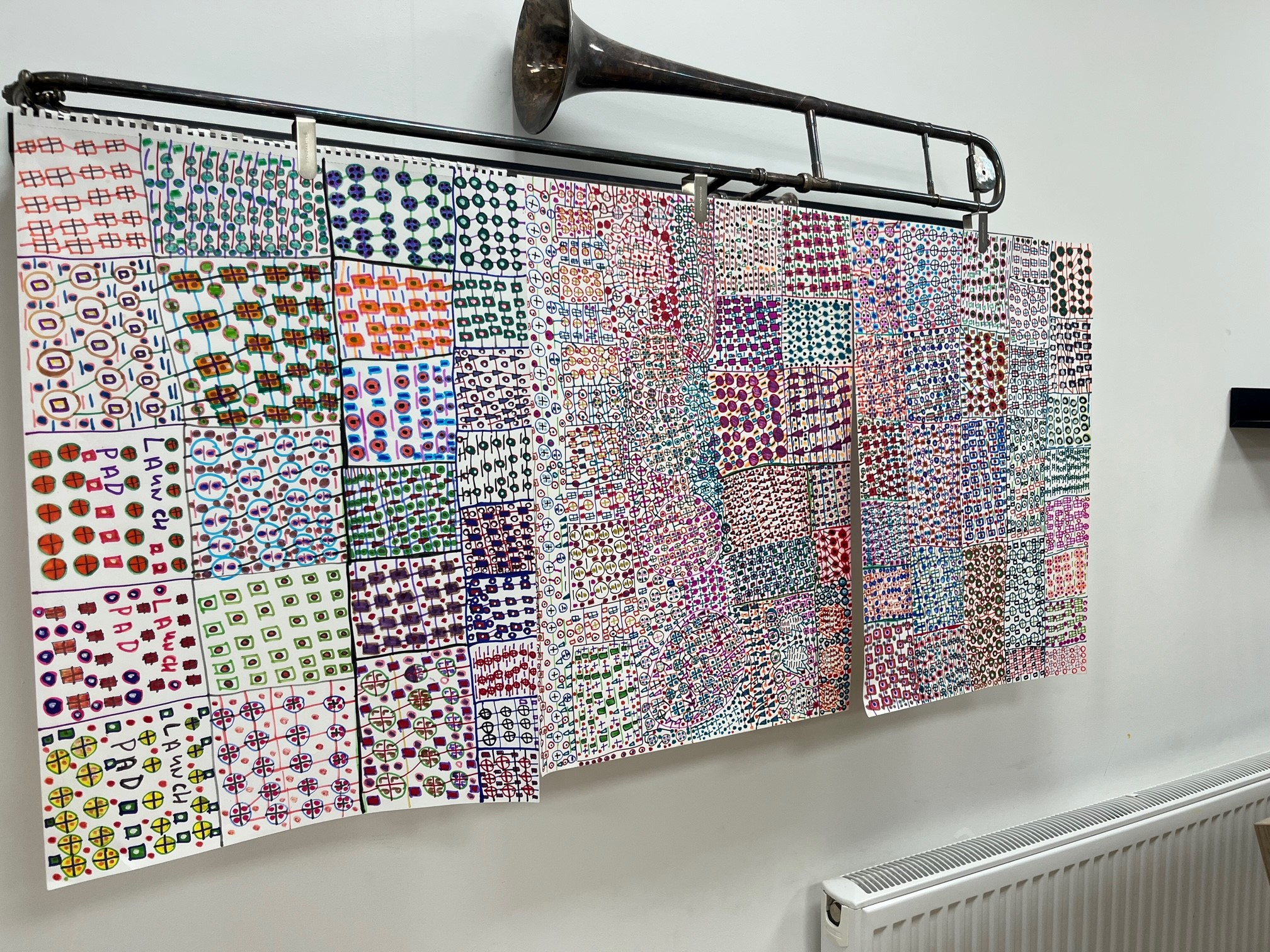 Artwork from the 2024 Launchpad 135 art exhibition - a long picture with a trombone on top