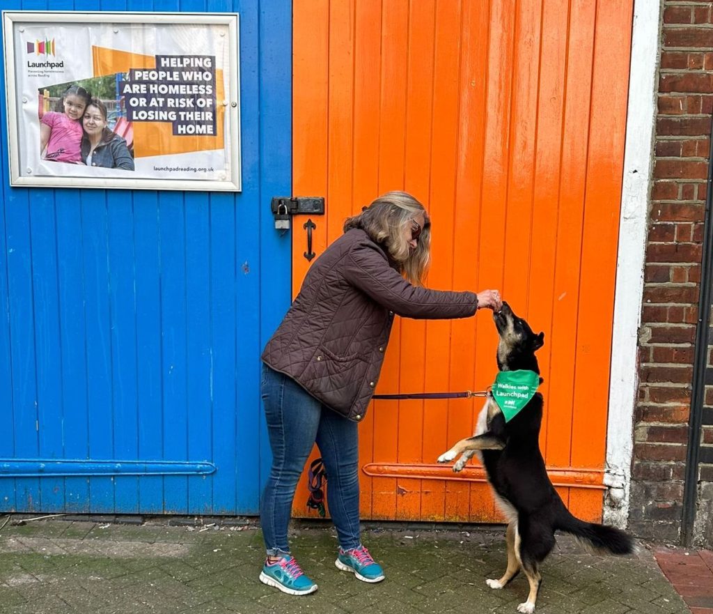 Sharon and her dog LunaLu outside Launchpad stable doors