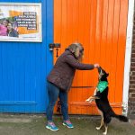 Sharon and her dog LunaLu outside Launchpad stable doors