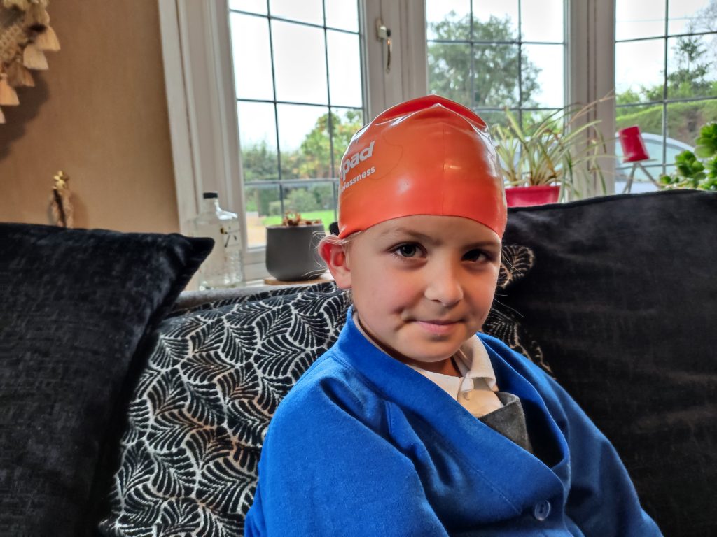 School pupil in a Launchpad swim hat