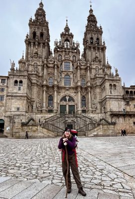 Lizzie standing outside of a church