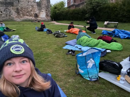 Fiona with people in their sleeping bags at Reading Abbey Ruins