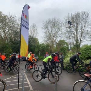 Photo of a group of cyclists, starting the 2024 Audax.