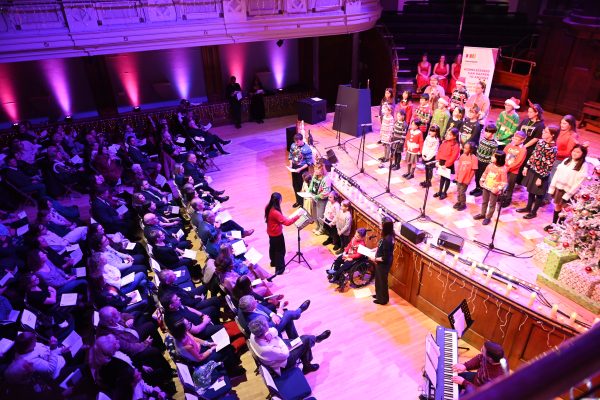 Choirs and audience at Carols By Candlelight