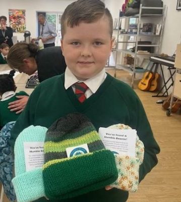 Schoolboy with knitted hats