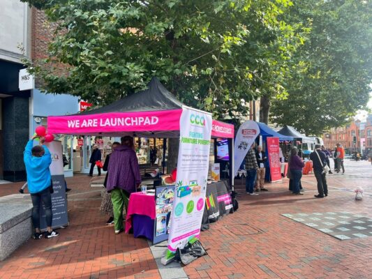 Colourful stand in the street for World Homeless Day